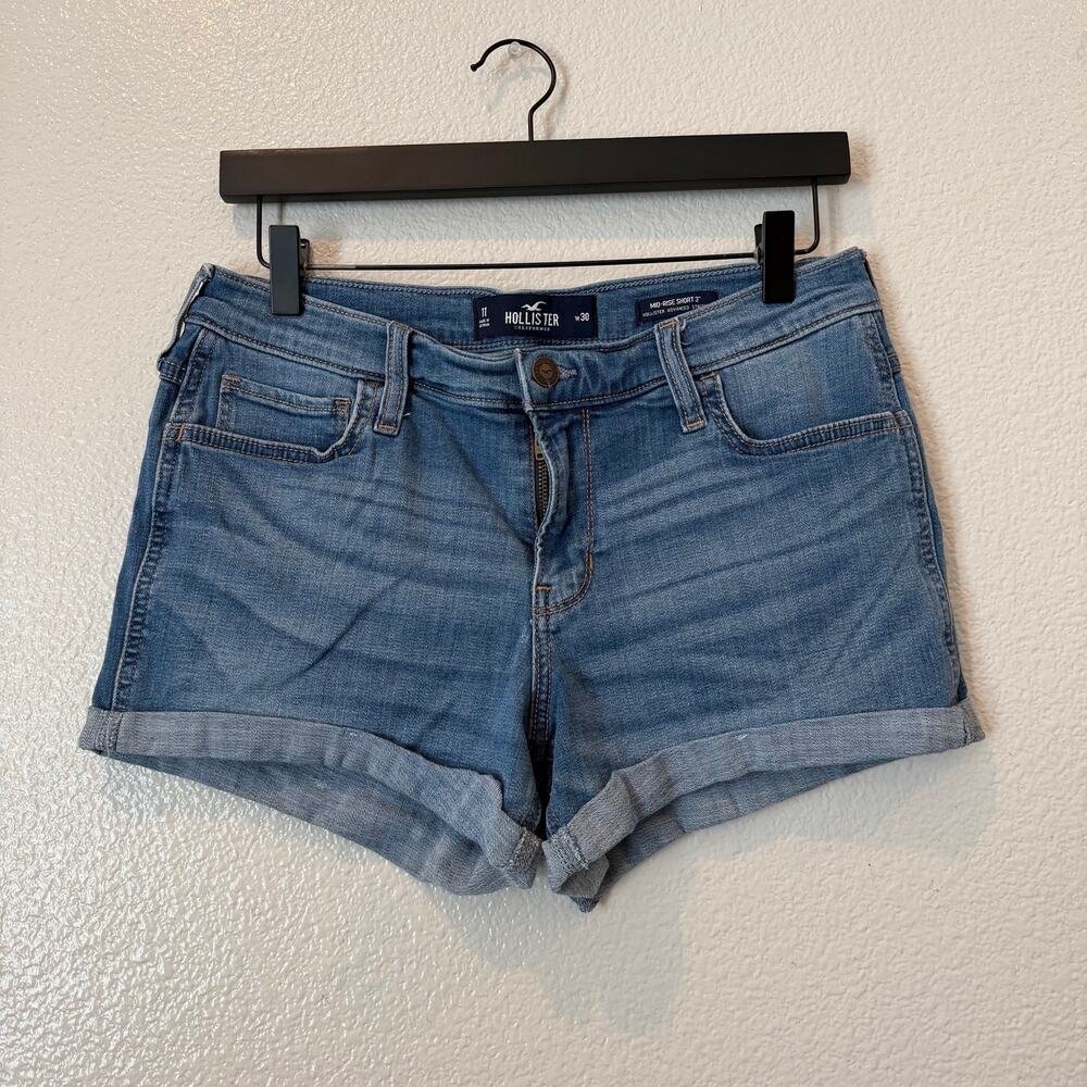 Hollister Advanced Stretch Mid-Rise Short 3” denim whisker wash raw rolled hem